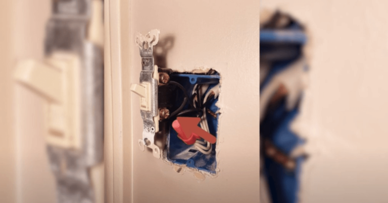 Image showing black wires in an open outlet